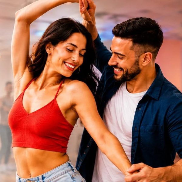 Groupe d’élèves souriants pendant un cours de danse à Genève